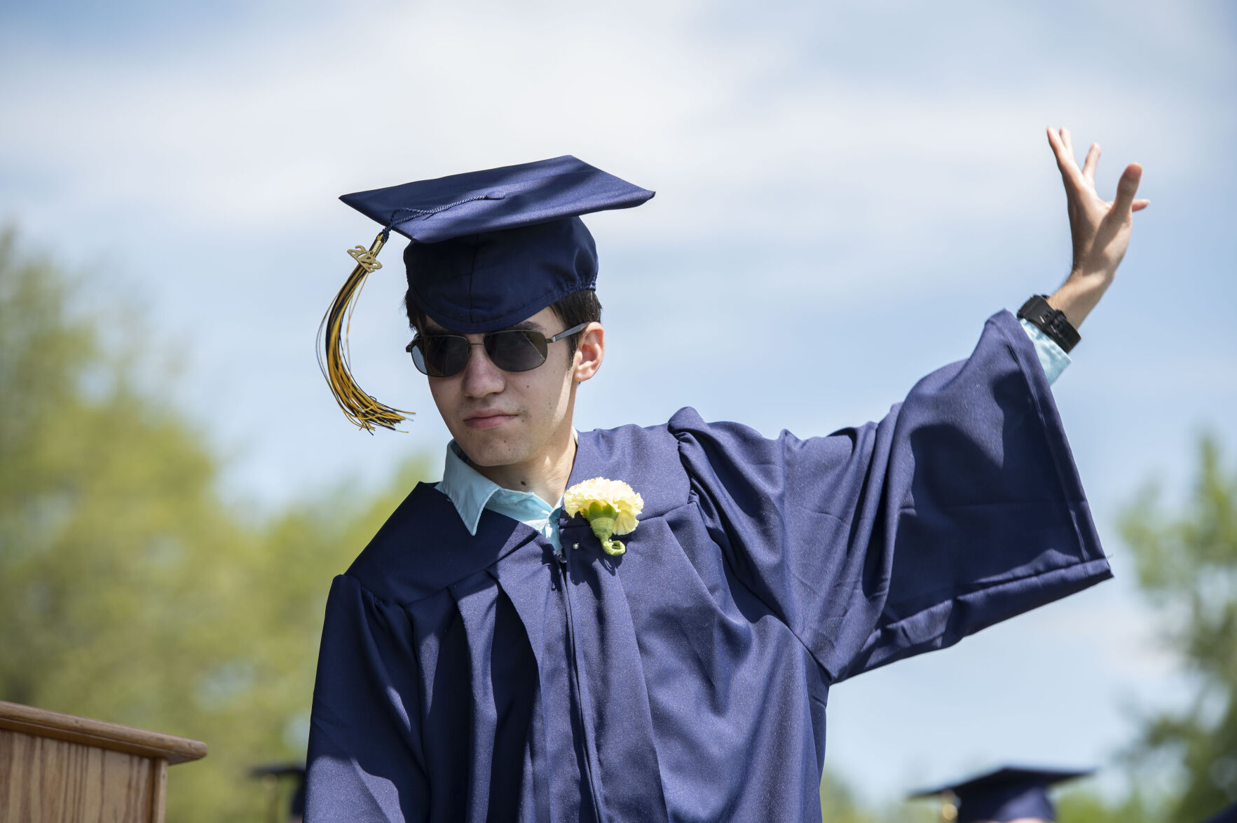 Student waving